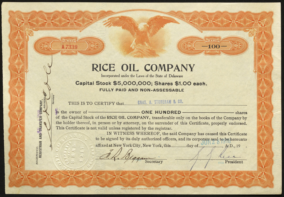 Certificate with black, blue, and orange ink shows intricate bordering, lettering, a company seal, signatures and a vignette of an eagle