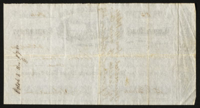 Backside shows handwriting that says ‘October 8 day (illegible)’