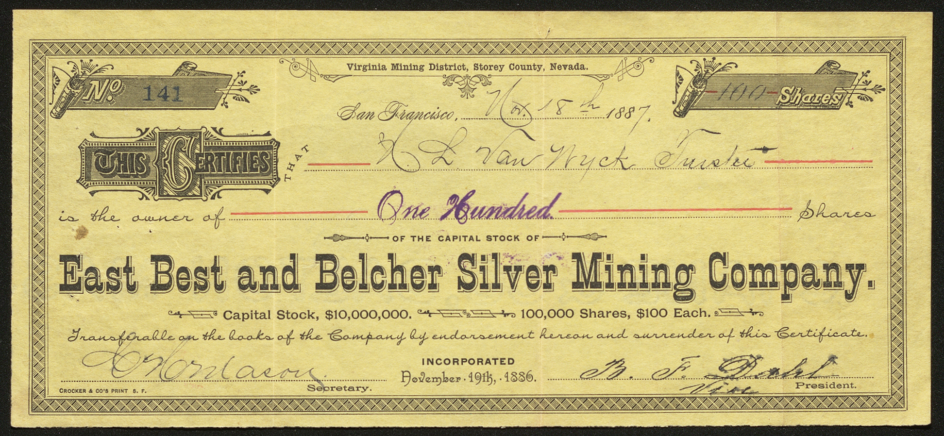 Certificate with black ink shows intricate borders, lettering, and numbers